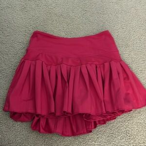 Gold Hinge skirt in a hot pinkish red color